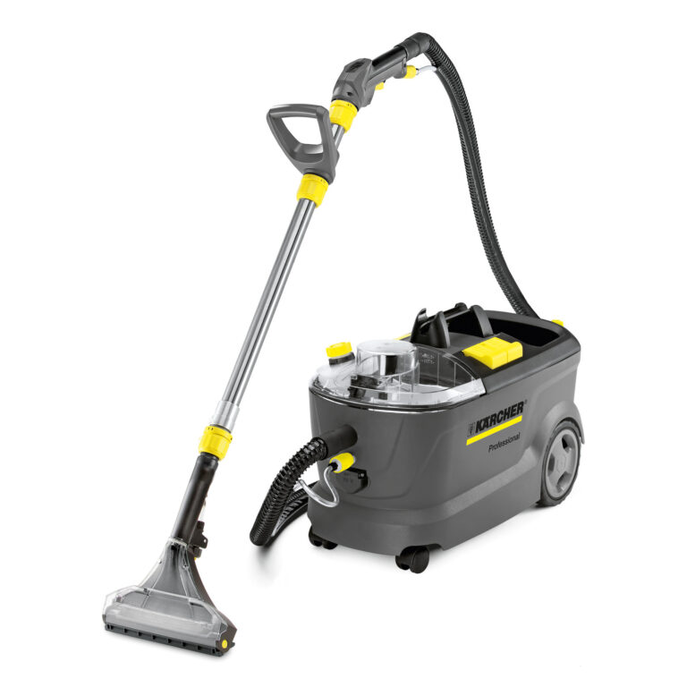 A professional karcher carpet cleaner with a large grey water tank, yellow handles, and a black hose with a cleaning attachment.