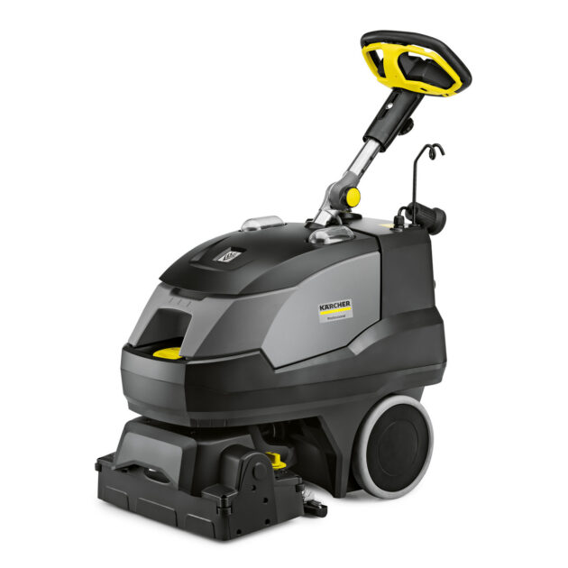 A Carpet Cleaner BRC 40/22 C professional walk-behind floor scrubber with a gray and yellow color scheme, featuring a handle and various control elements on top.