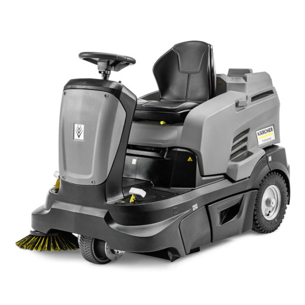 A modern Vacuum Sweeper KM 90/60 R BP Pack with a gray and yellow body, featuring a large dirt collection container, sturdy wheels, and an adjustable seat, isolated on a white background.