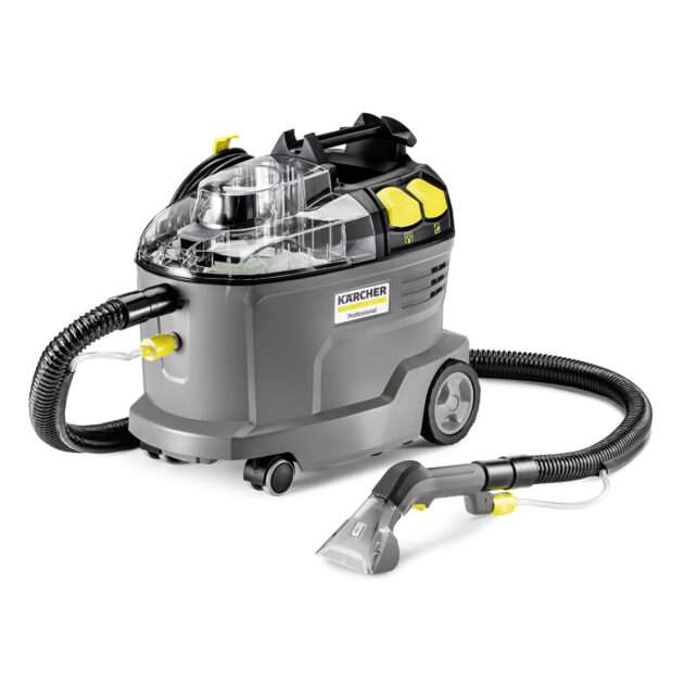 Professional Spray Extraction Cleaner Puzzi 8/1 C by kärcher with transparent water tank, black hose, and cleaning attachment on a white background.
