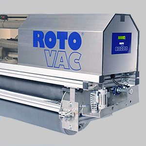 Industrial vacuum packaging machine, labeled "roto vac", with a stainless steel body and digital display, used for food packing and preservation.