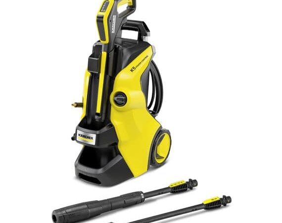 A yellow and black High Pressure Washer K5 Power Control with various attachments displayed, including nozzles and a spray gun, arranged on a white background.