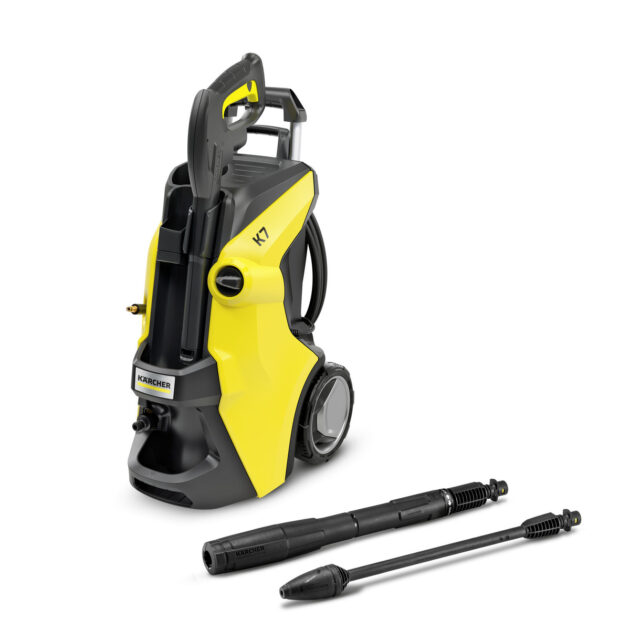 A Karcher K7 Power with its accessories, featuring a modern design in black and yellow, displayed against a white background.