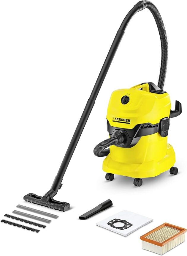 A yellow WD4 Wet And Dry Vacuum Cleaner with multiple attachments including a floor nozzle, brushes, and filters, on a white background.